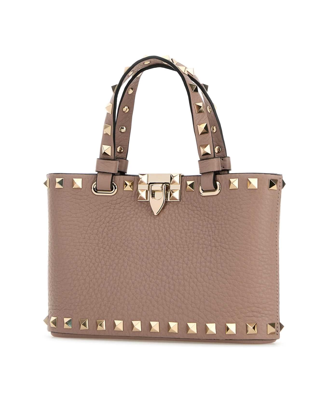 Valentino Garavani Antiqued Pink Leather Rockstud Handbag - POUDRE
