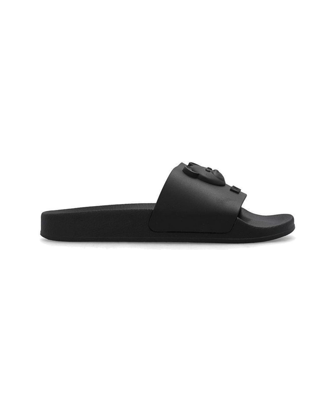 Moschino Logo Embossed Slip-on Sandals - Black