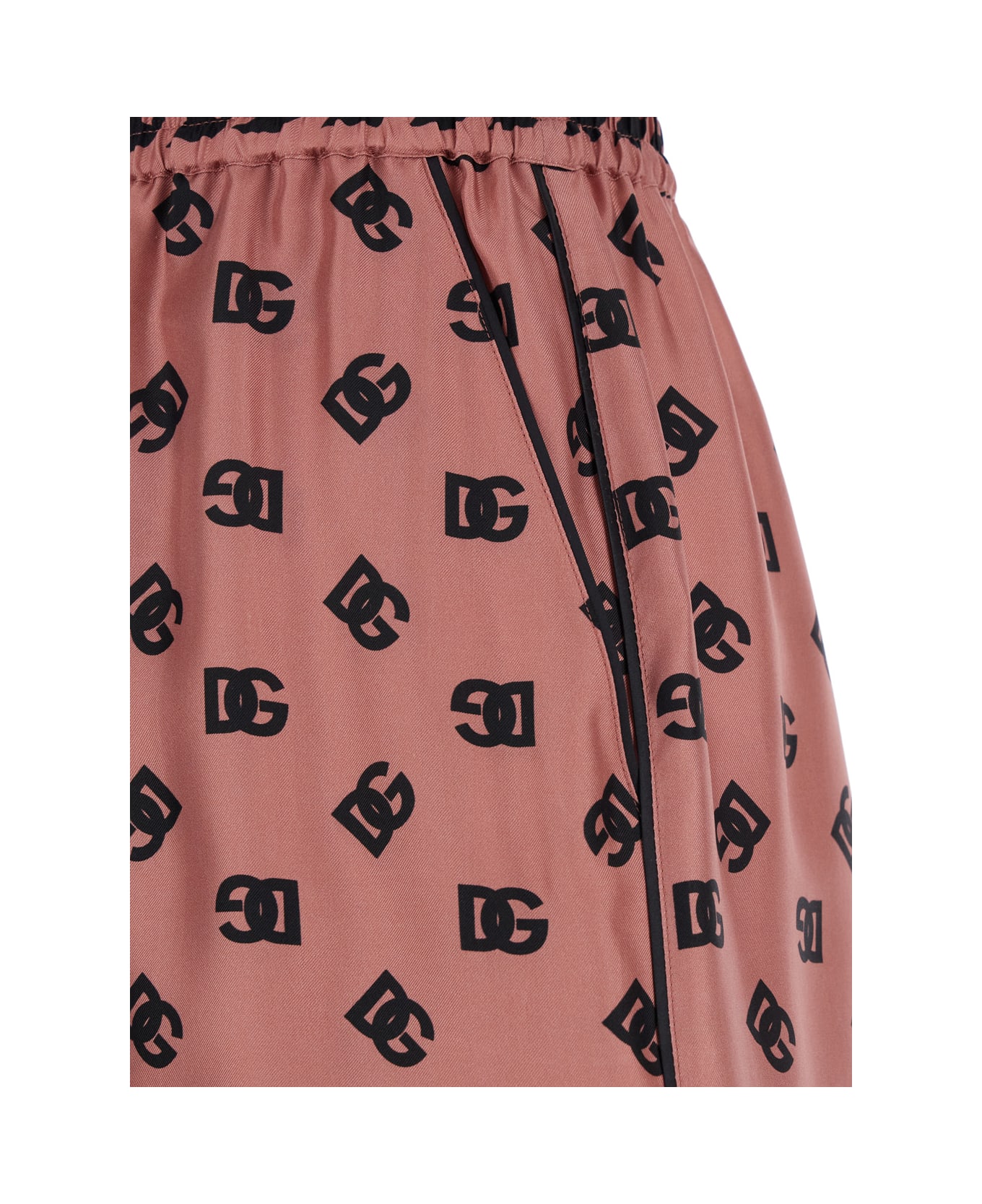 Dolce & Gabbana Pink Bermuda Shorts With Dg Logo Printed All-over In Silk Woman - Pink