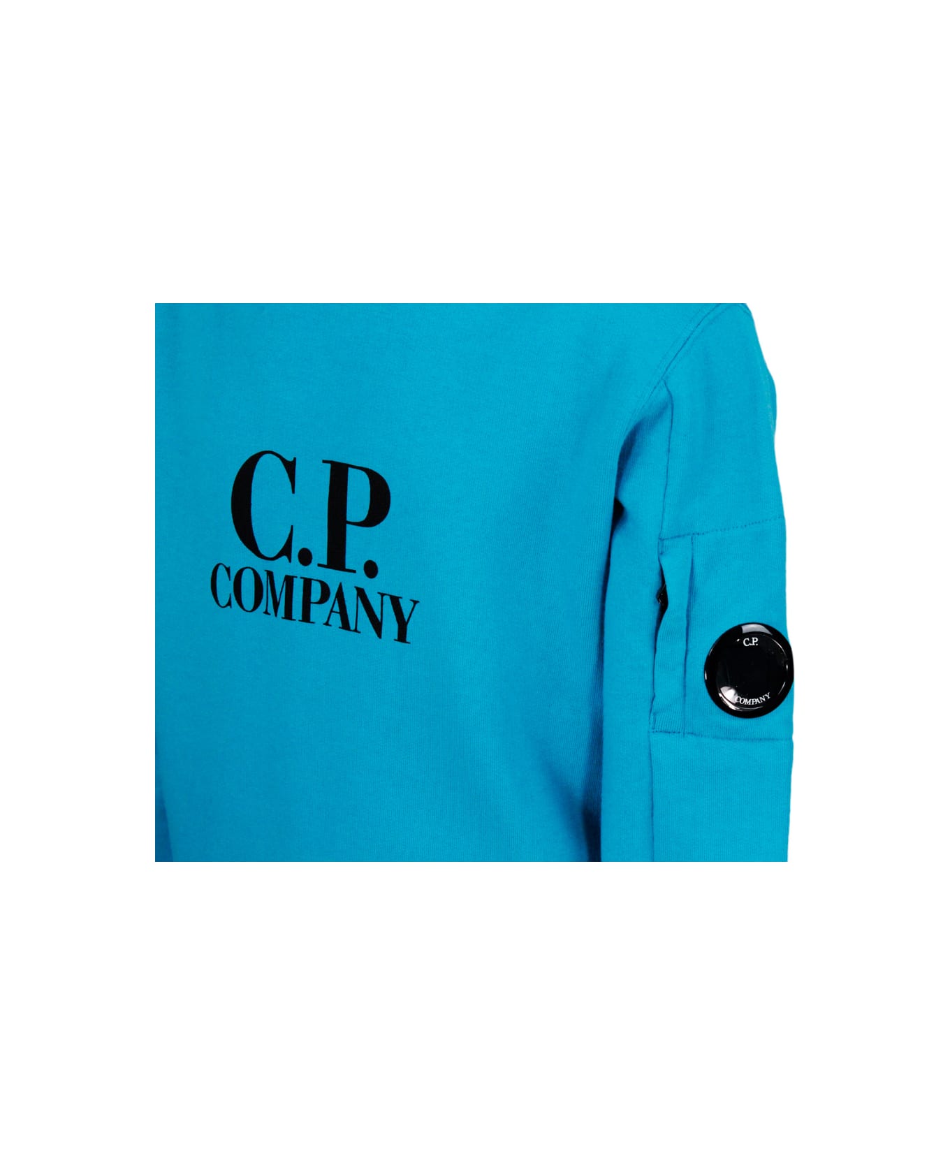 C.P. Company Long-sleeved Crewneck Sweatshirt In Breathable Cotton Fleece With Logo On The Chest And Eyeglass Lens On The Shoulder - Blu royal
