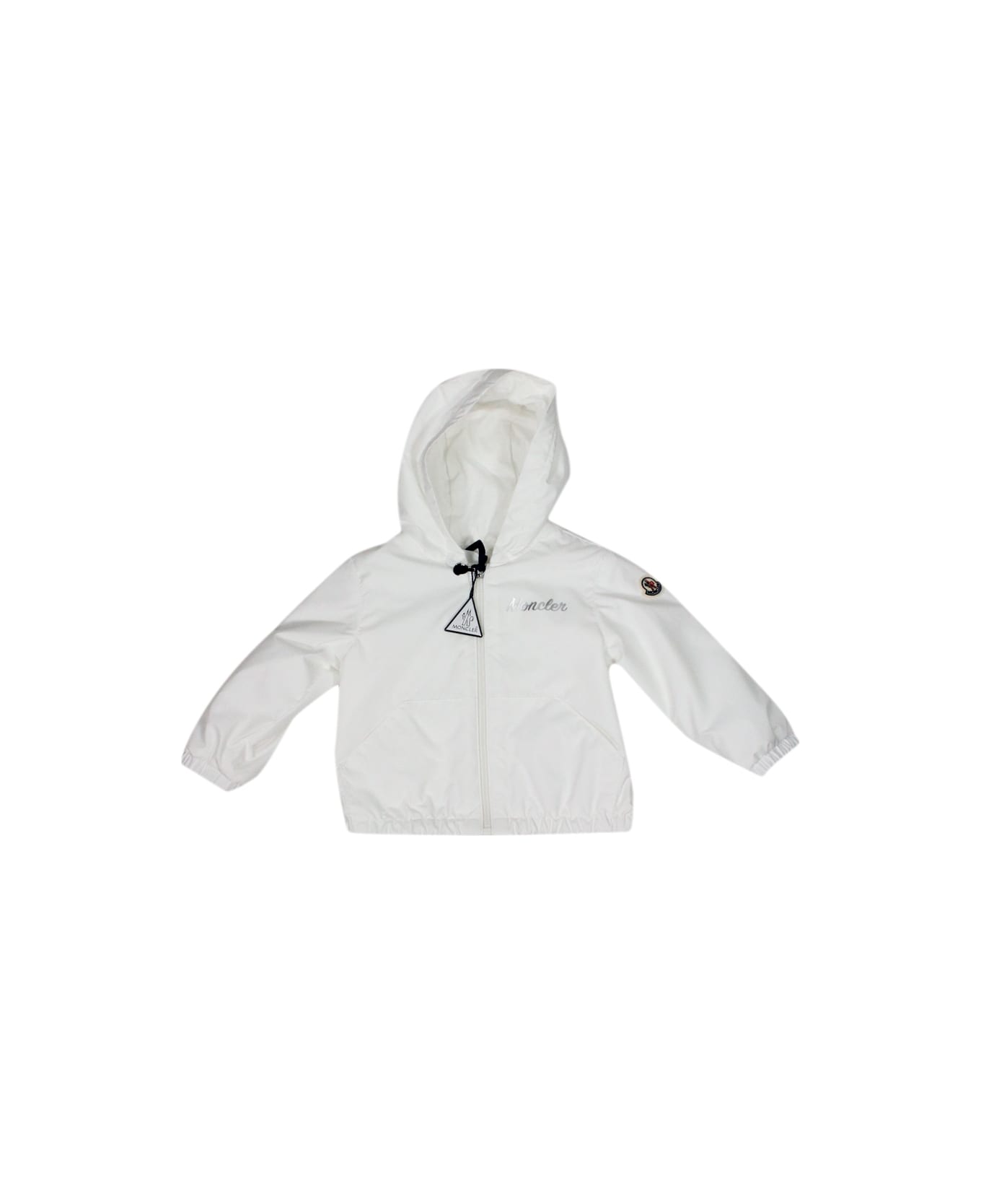 Moncler Evanthe Baby Windproof Jacket With Hood And Zip Closure And Silver Logo Writing On The Chest. - White