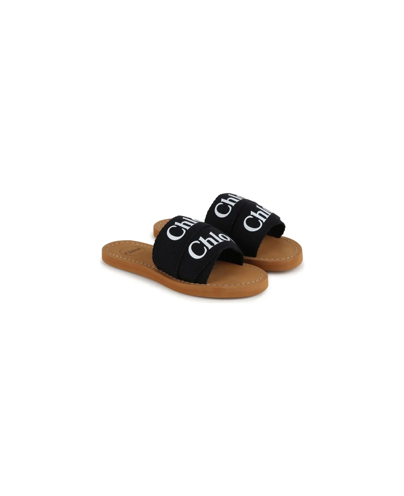 Chloé Woody Sandals In Black Canvas With Logo - Nero シューズ