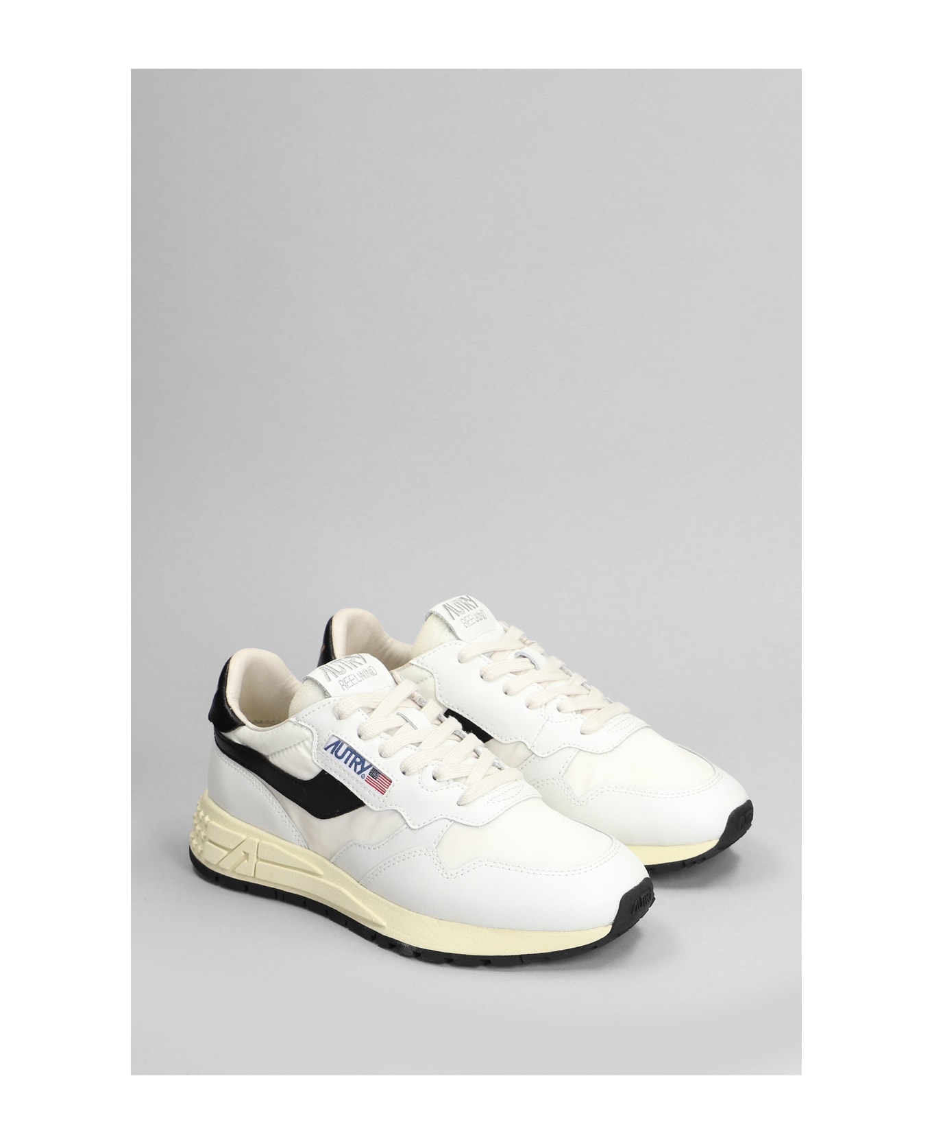 Autry Reelwind Low Sneakers In White Leather And Fabric - white