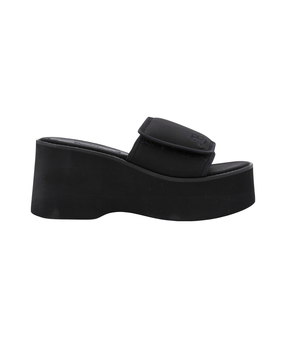 サンダル・ミュール Courreges Black stretch polyester blend Scusa Wave slippers Courrèges Black Stretch Polyester Blend Scusa Wave Slippers