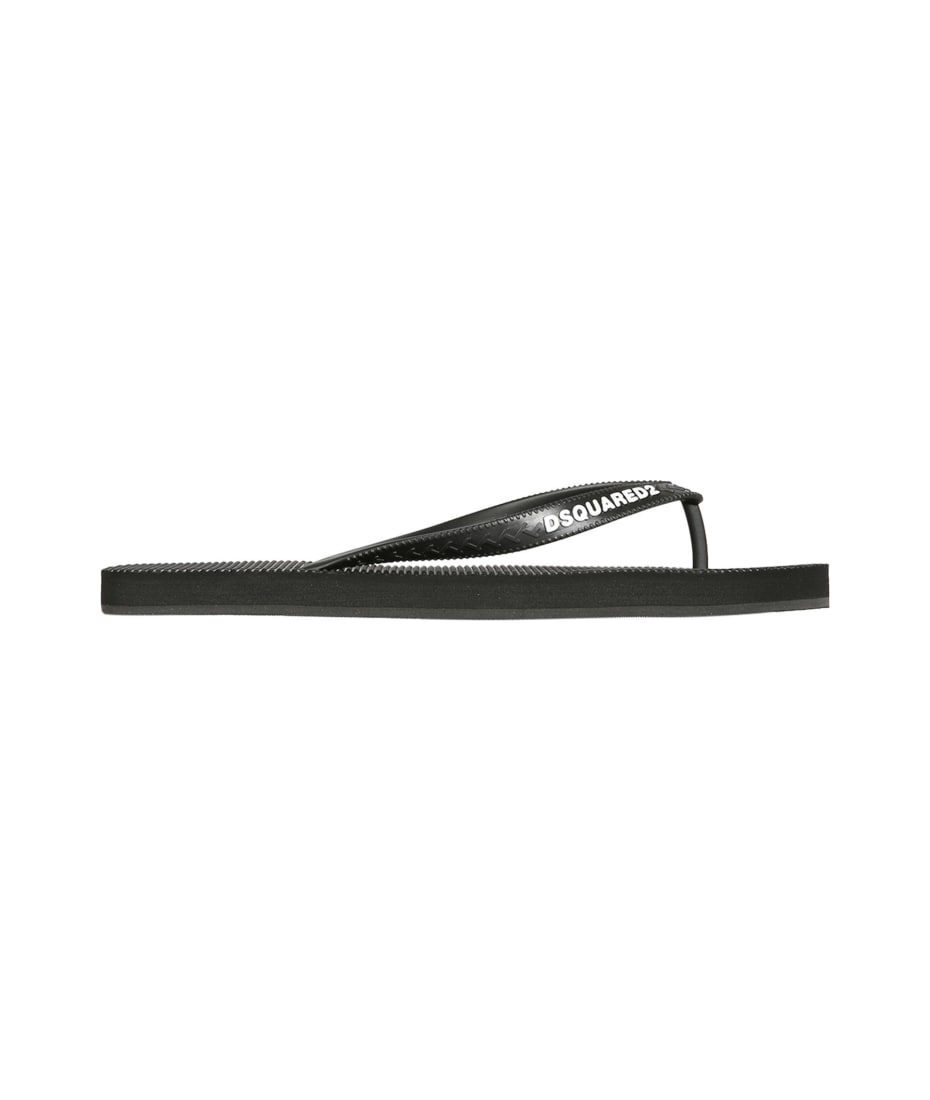 Dsquared2 ロコ ティテル ストレッチ フリフ D8L6457400 101 DSQUARED2 logo-embossed Slides | Black | FARFETCH JO