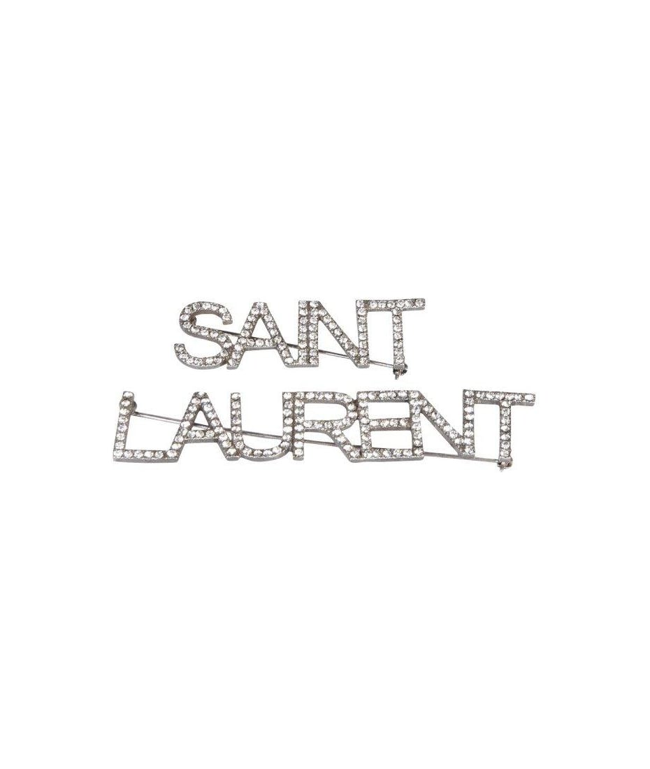 CASSANDRE brooch in metal, Saint Laurent