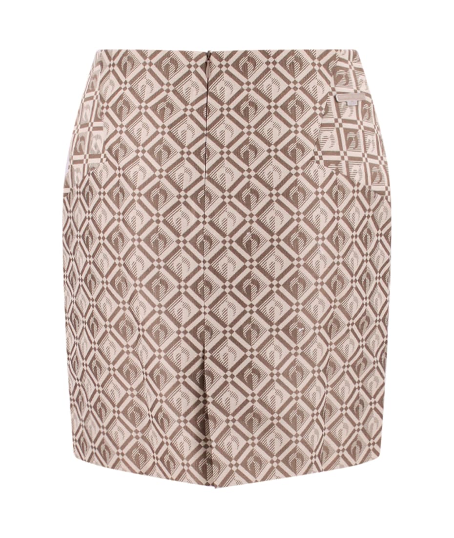 Monogram-print patchwork denim mini skirt, Marine Serre