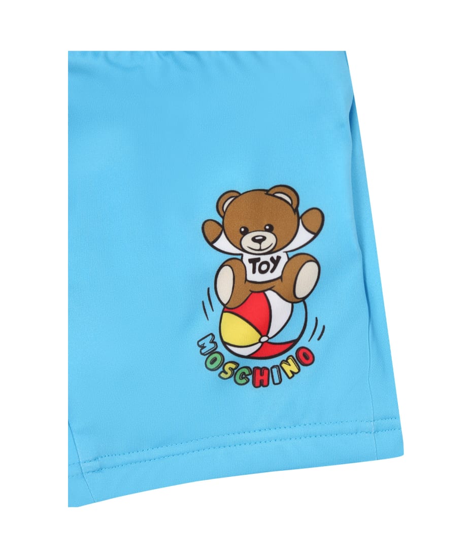 Moschino Light Blue Swimsuit For Baby Boy With Teddy Bear And Multicolor Logo - Light Blue