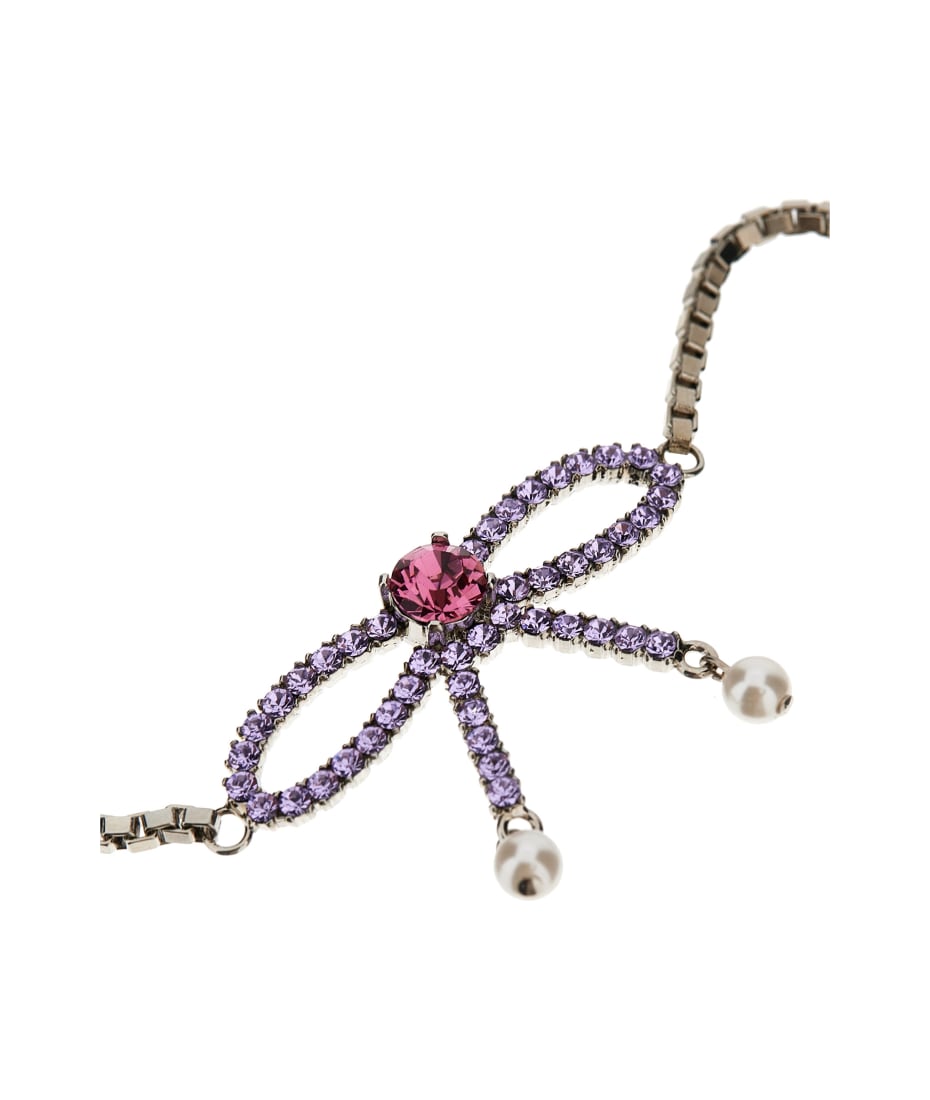【送料&関税込】Dsquared2 Bow Crystal Long Earrings Dsquared2 Bow Crystal Long Earrings | italist