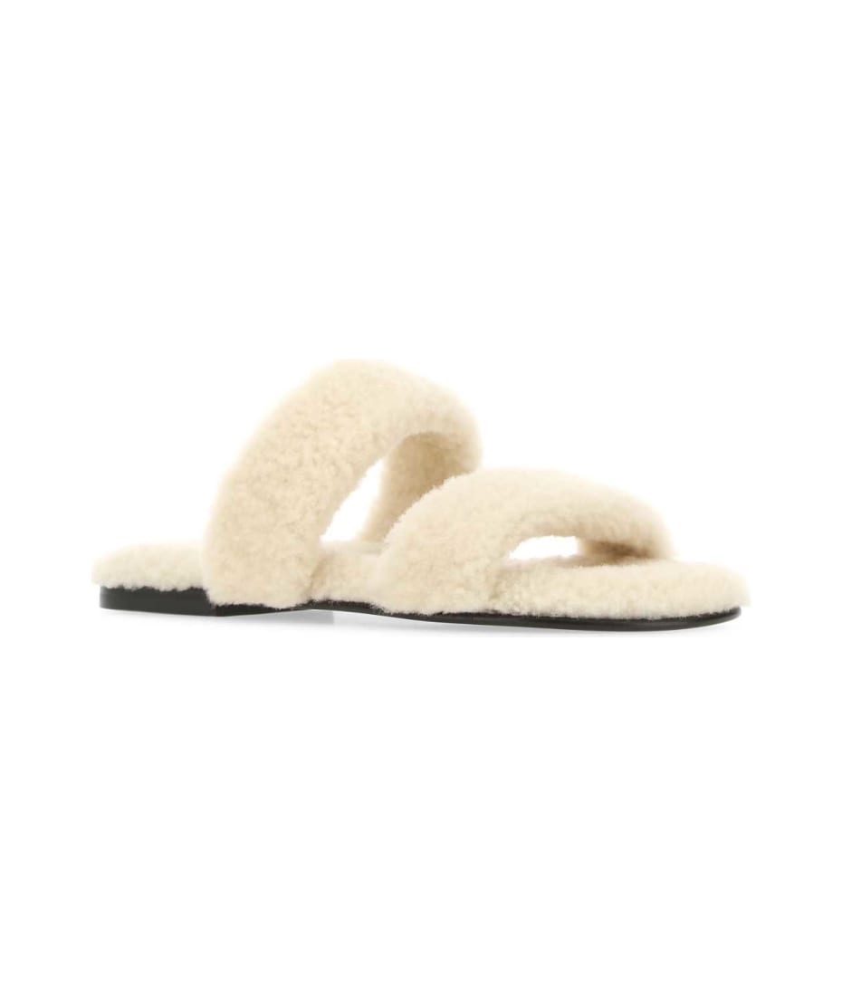 サンダル SAINT LAURENT Ivory Shearling Bleach Slippers Saint Laurent Ivory Shearling Bleach Slippers | italist