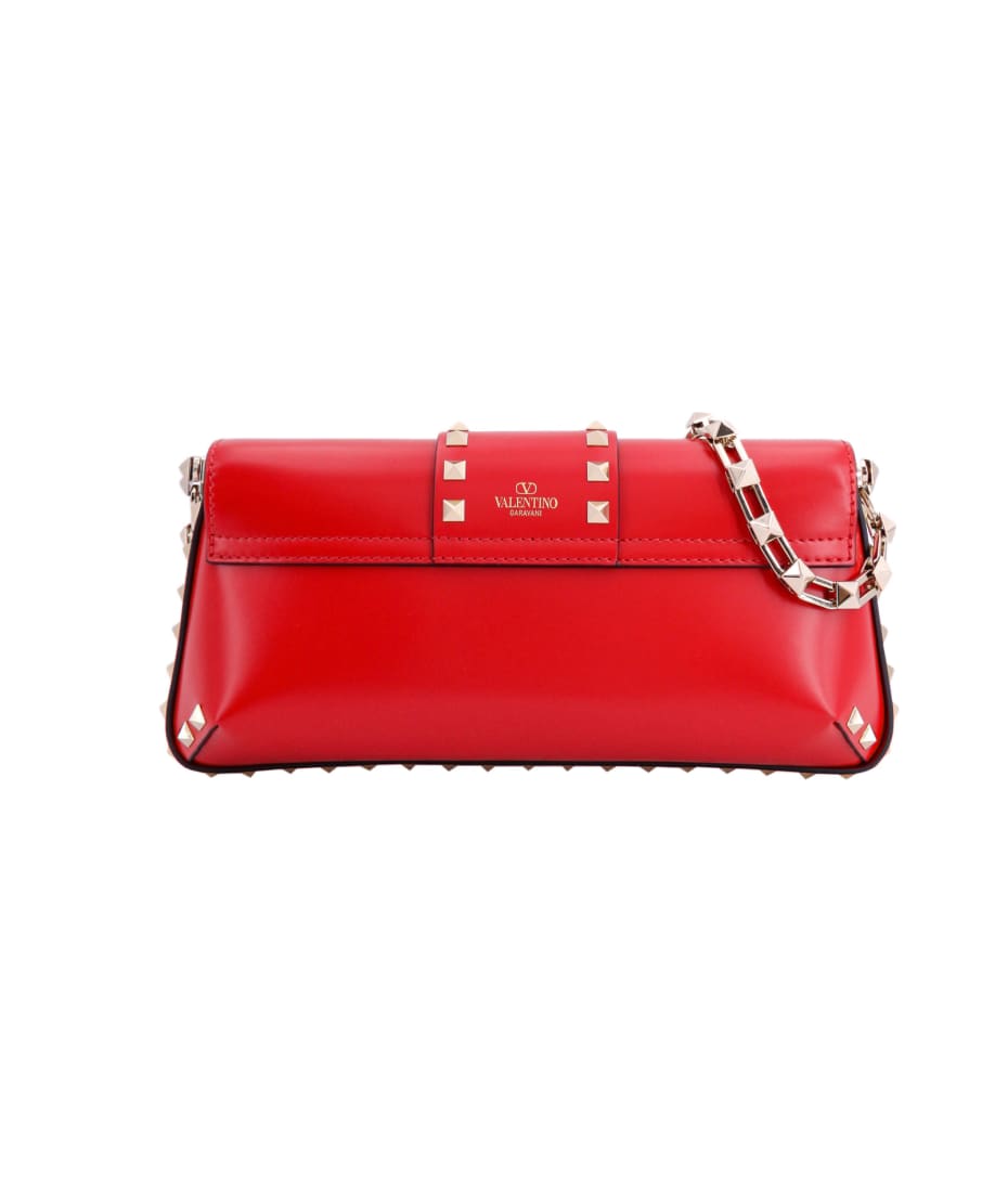 Valentino Garavani Rockstud Leather Clutch Bag In Red