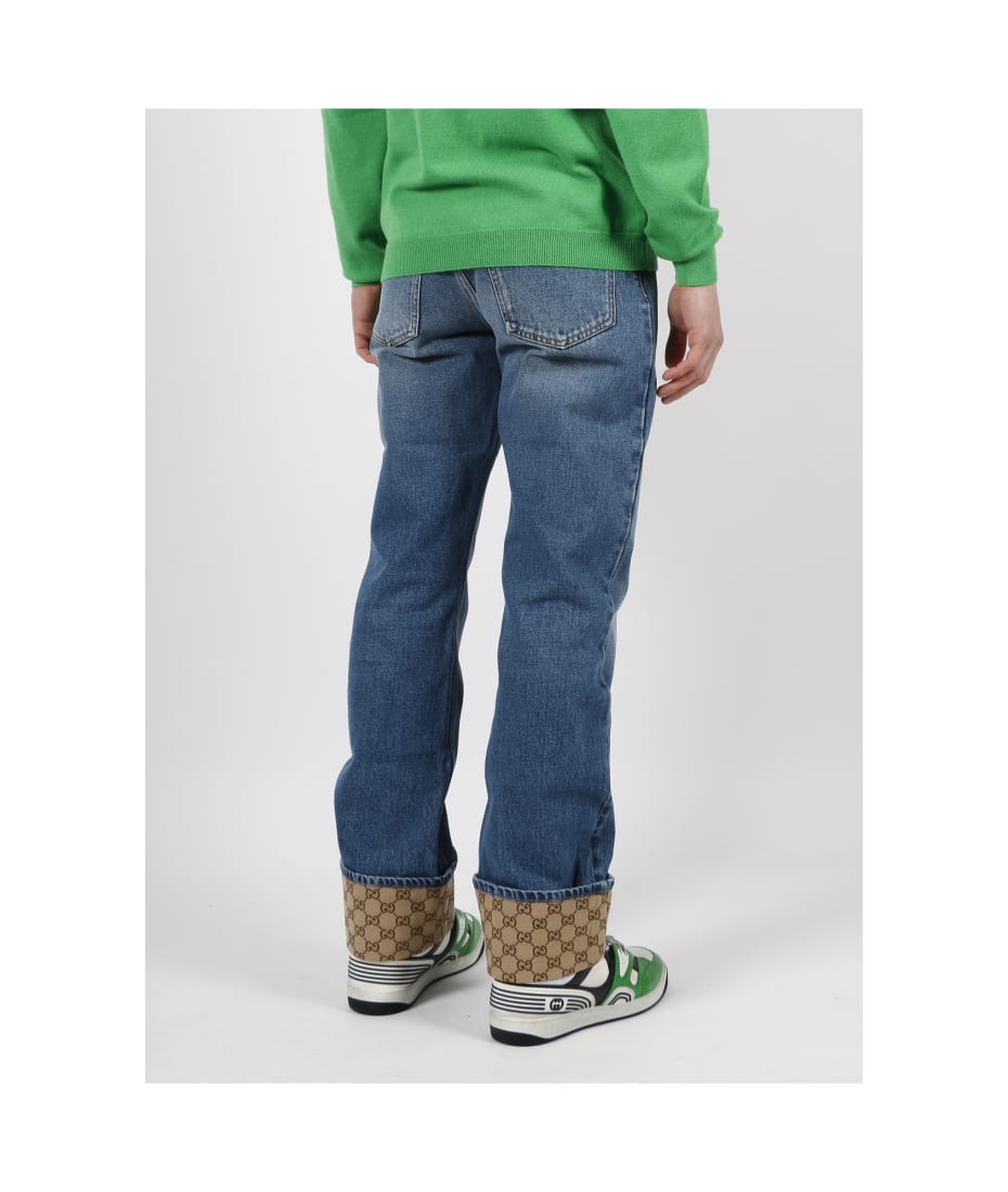 GUCCI Jeans Men, Denim trousers with GG cuff Blue