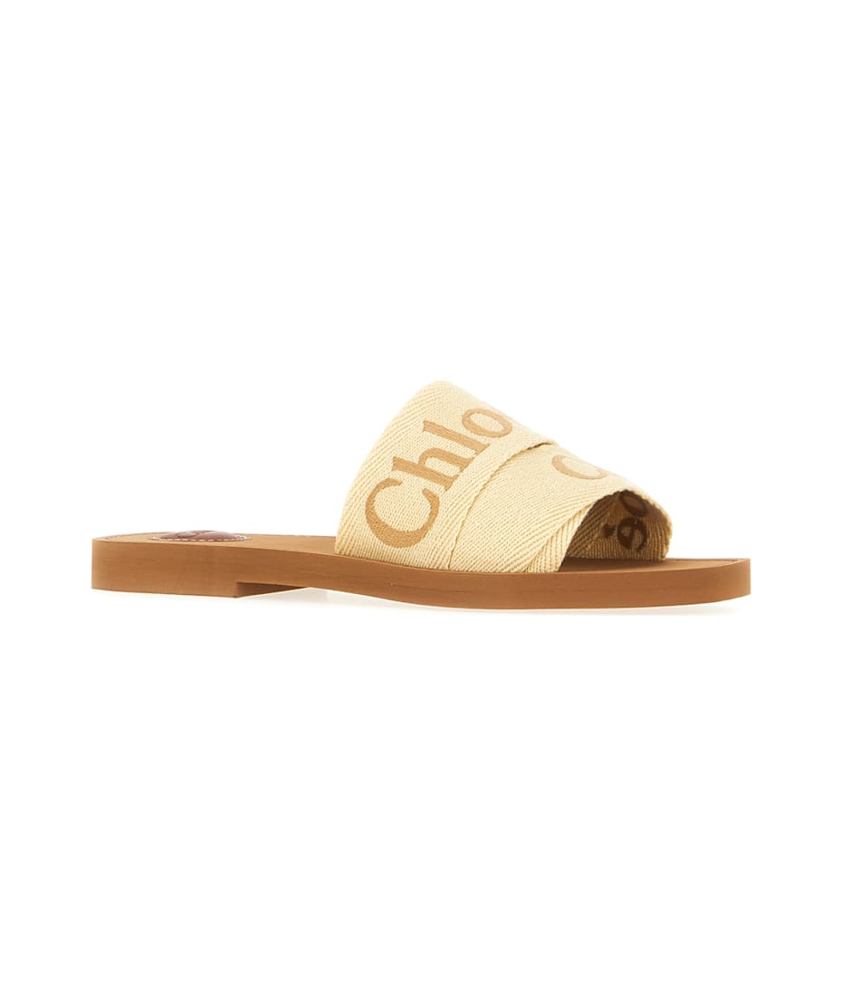 【関税&送料込】Chloe Beige Linen Woody Slippers Chloé Cream Linen Blend Woody Slippers | italist