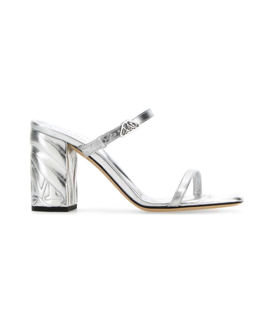 【送料&関税込】Alexander McQueen Leather Seal Mules Alexander McQueen Leather Seal Mules | italist