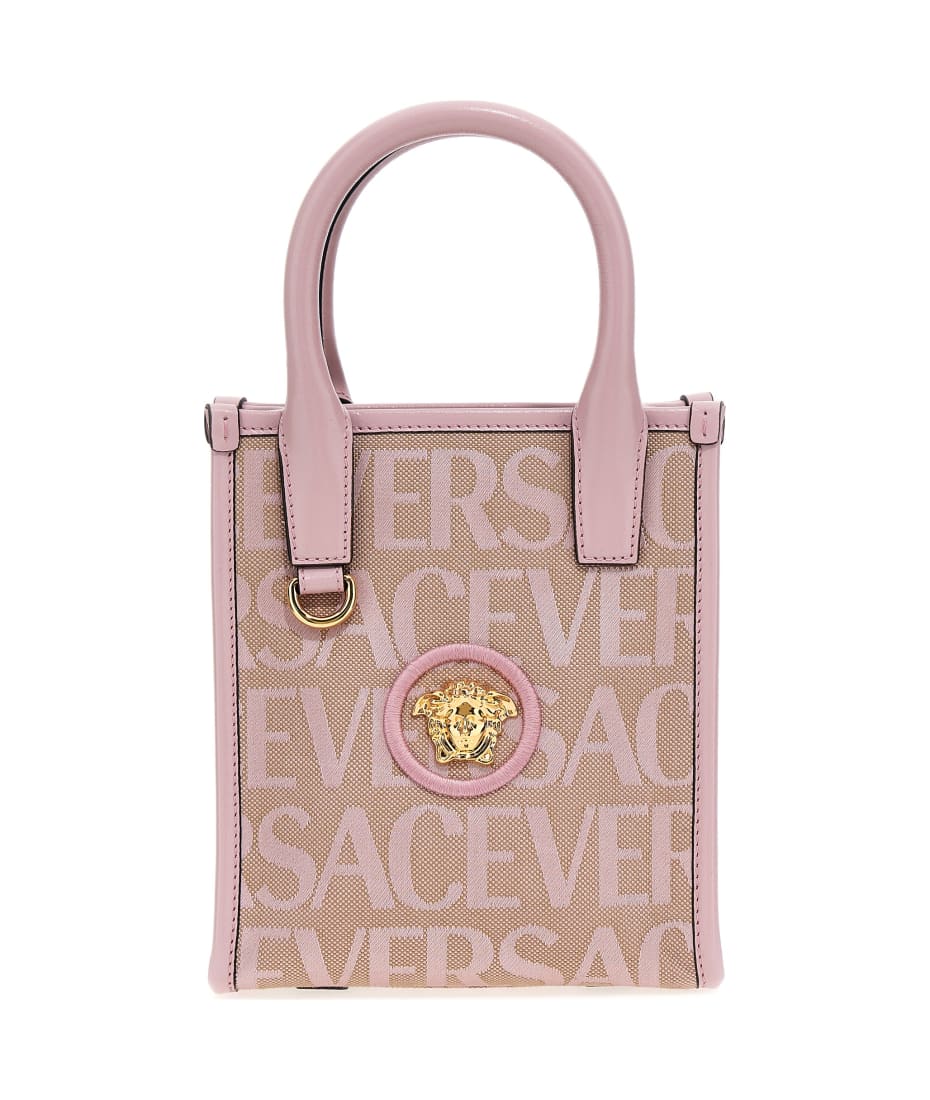 All over logo large tote bag by Versace La Vacanza