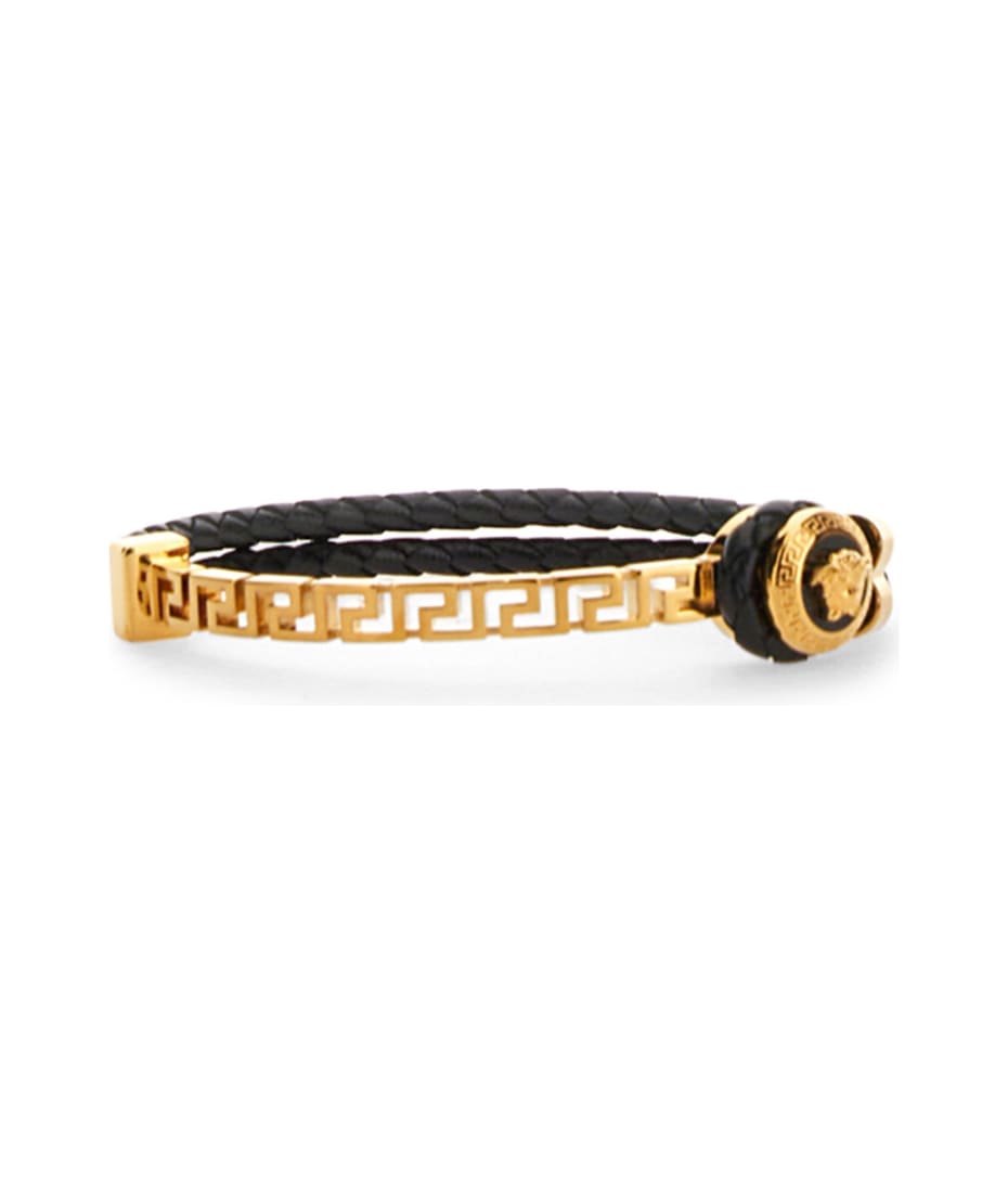 Logo Cuff Bracelet in Gold - Versace | Mytheresa