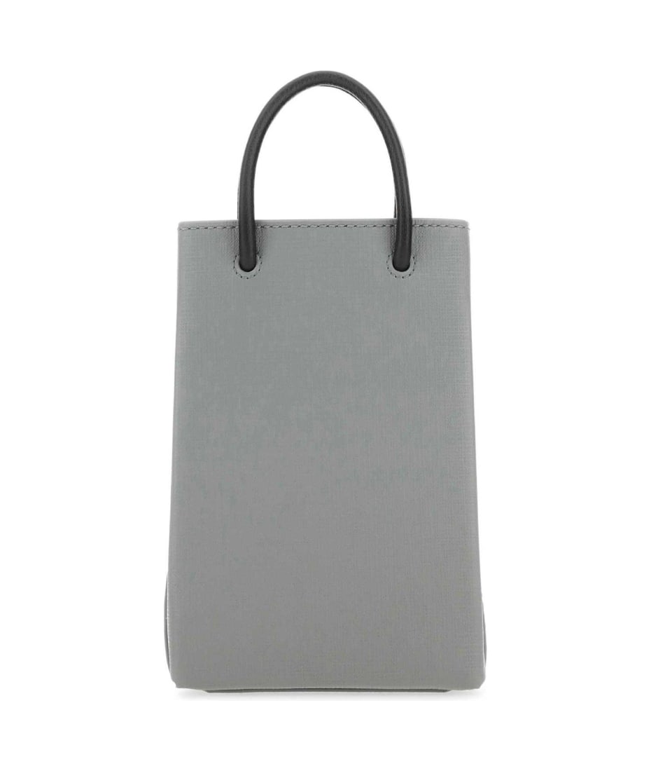 スマホケース・テックアクセサリーその他 BALENCIAGA PHONE CASE (7577730AI2N 1160) Balenciaga Logo Printed Phone Holder | italist