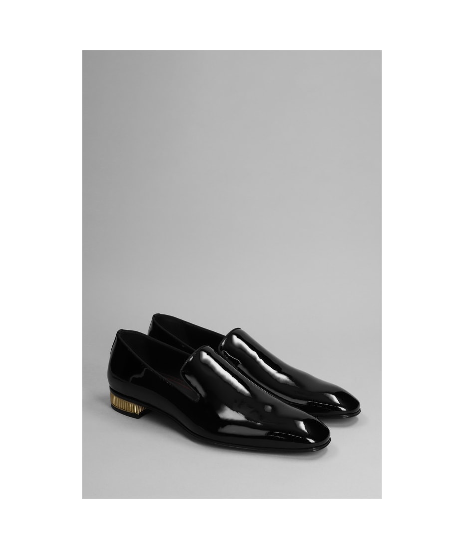 Christian Louboutin- Black patent leather slip on / loafer with