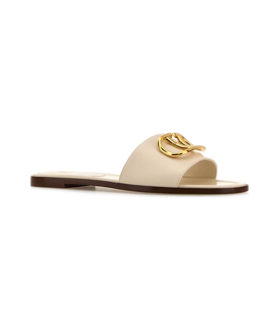 サンダル・ミュール VALENTINO GARAVANI Beige Leather Vlogo Slippers VALENTINO GARAVANI VLogo embellished leather slides | NET-A