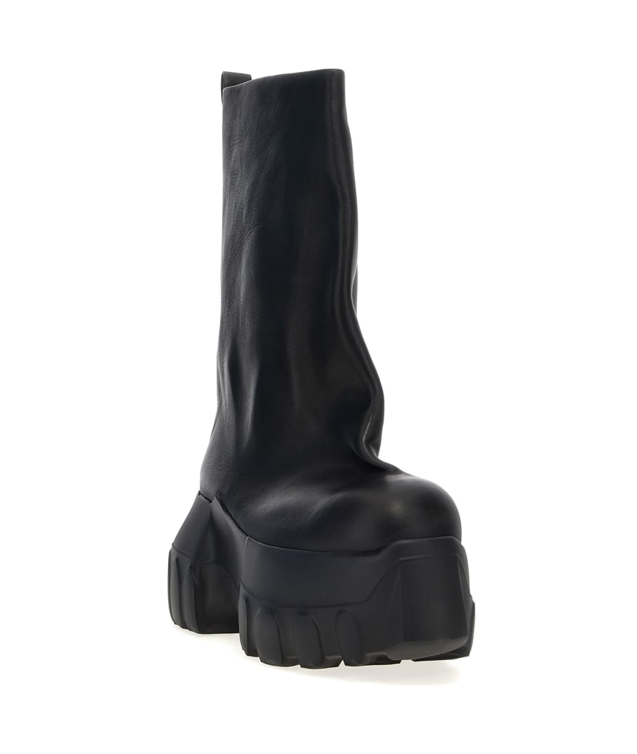 靴 Hollywood Flared Mega Tractor Black Hollywood Flared Mega Tractor Boots by Rick Owens on Sale
