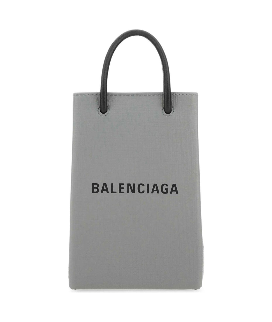 スマホケース・テックアクセサリーその他 BALENCIAGA PHONE CASE (7577730AI2N 1160) Balenciaga Logo Printed Phone Holder | italist