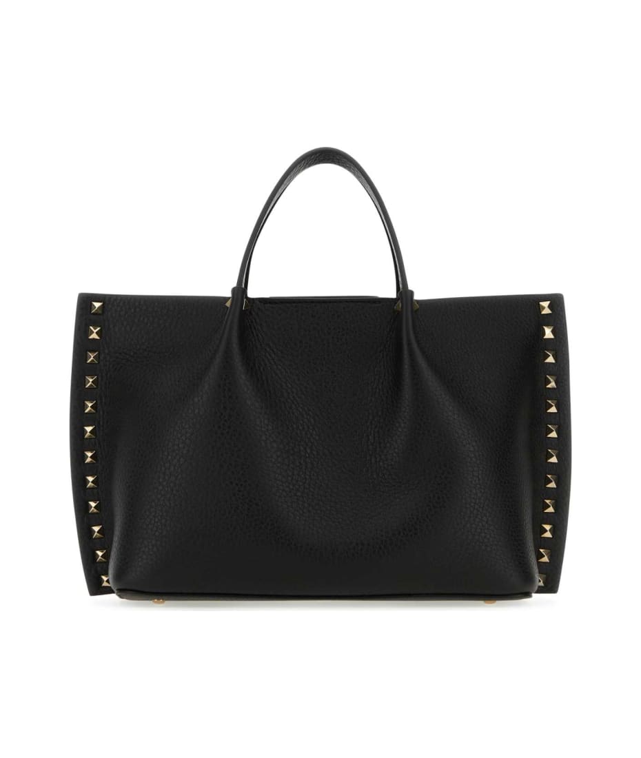 Valentino Garavani ミディアムハンドバッグ ブラック FW24/25 Valentino Garavani Black Leather Rockstud Handbag | italist