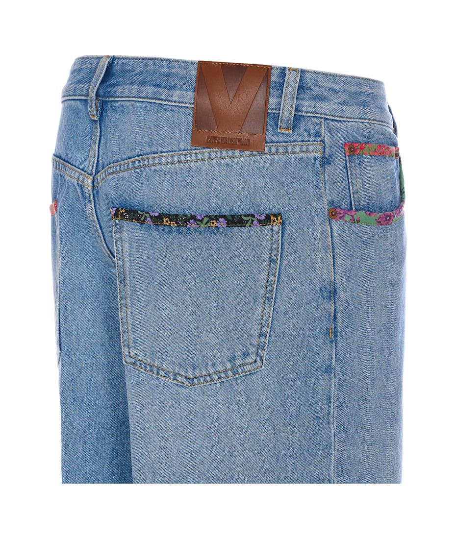 デニム・ジーパン VALENTINO SS25 Floreal trim jeans Valentino Garavani Floral Print Hem Denim Trousers | italist