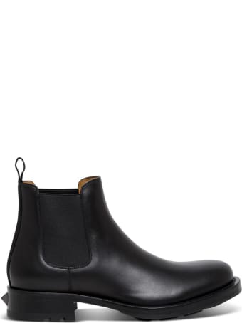 Valentino Garavani Roman Stud Ankle Boots In Black Leather