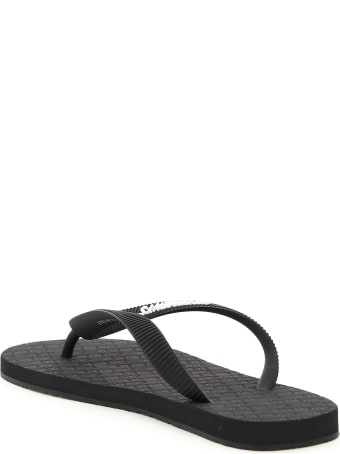 VETEMENTS Rubber Flip Flops Logo