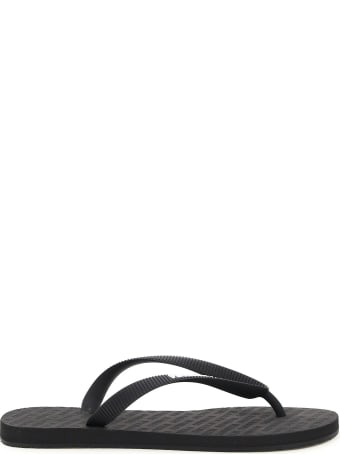 VETEMENTS Rubber Flip Flops Logo