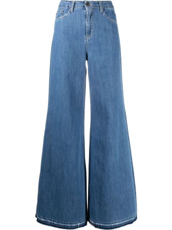 Merci Flared Jeans In Blue Denim