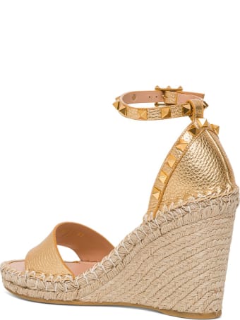 Valentino Garavani Rockstud Double Wedge Sandal In Laminated Leather