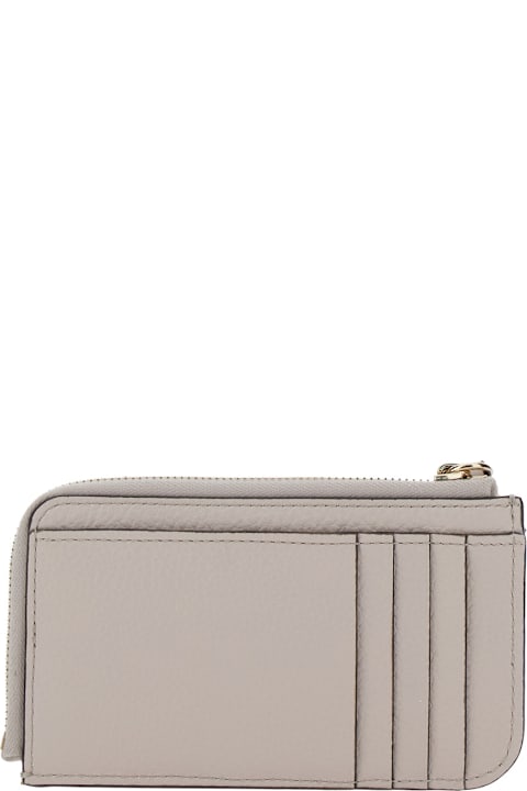Chloé إكسسوارات لـ السيدات Chloé Grey Wallet With Logo Charm On The Front And Top Zip Closure In Grained Leather Woman