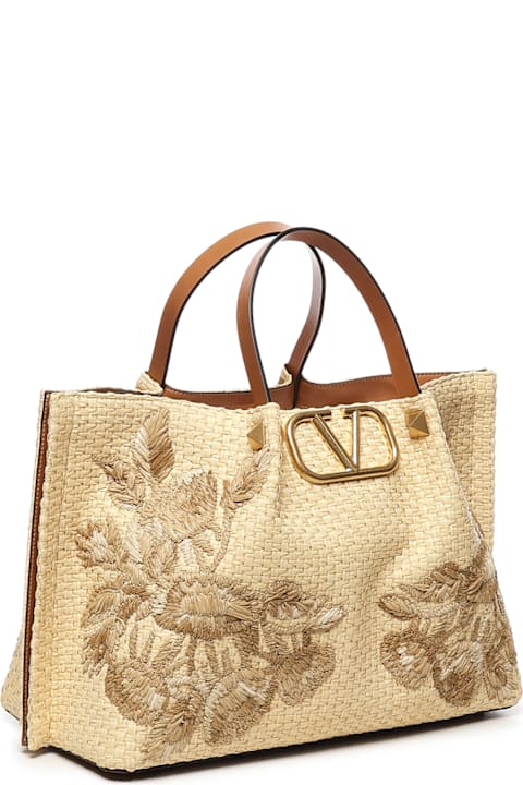 Valentino Garavani لـ Women Valentino Garavani Vlogo Signature Tote Bag In Raffia