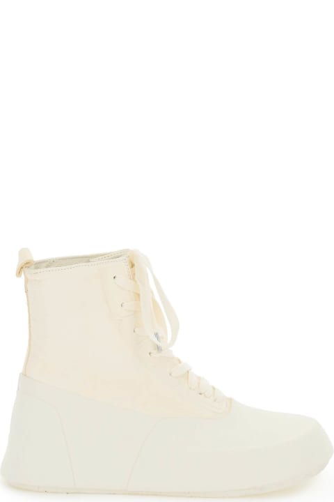 Rubber And Leather Hi-top Sneakers