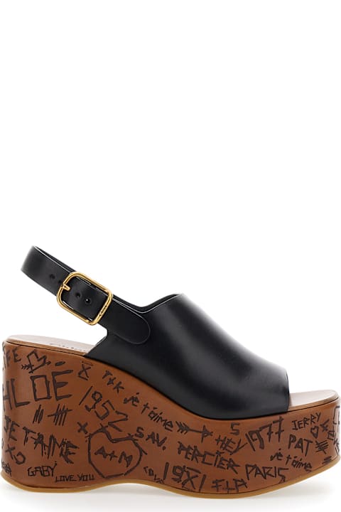 Chloé 
maxime
 Black Wedge With Engraved Written Decorations And Logo Buckle In Leather Woman