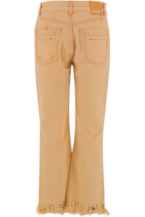 Jacquemus for Women Jacquemus Distressed-effect Flared Jeans