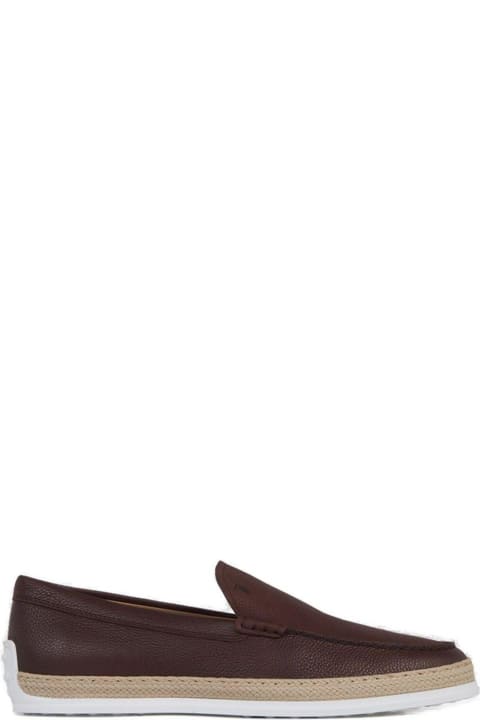 Tod's Loafers & Boat Shoes for Men Tod's Round Toe Slip-on Loafers