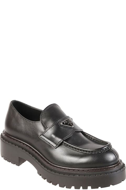 Prada Loafers & Boat Shoes for Men Prada Logo Plaque Almond-toe Loafers