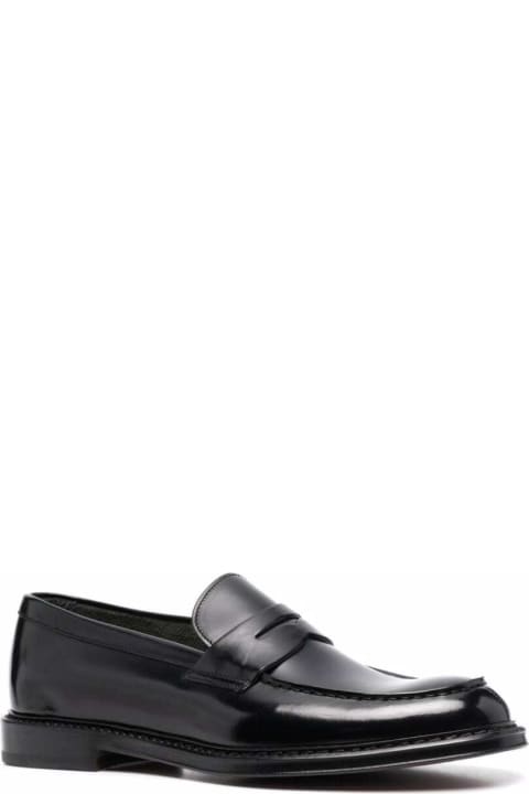 Doucal's Loafers & Boat Shoes for Women Doucal's Black Slip-on Loafers With Round Toe In Patent Leather Man