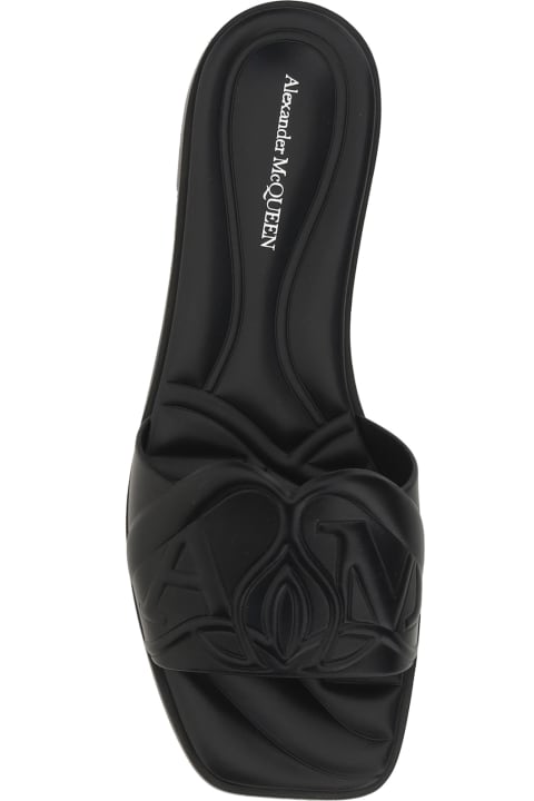 Alexander McQueen The Seal Embossed Slip-on Slides | italist