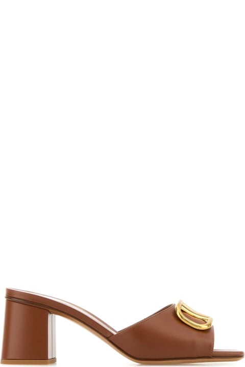Valentino Garavani for Women Valentino Garavani Caramel Leather Vlogo Mules