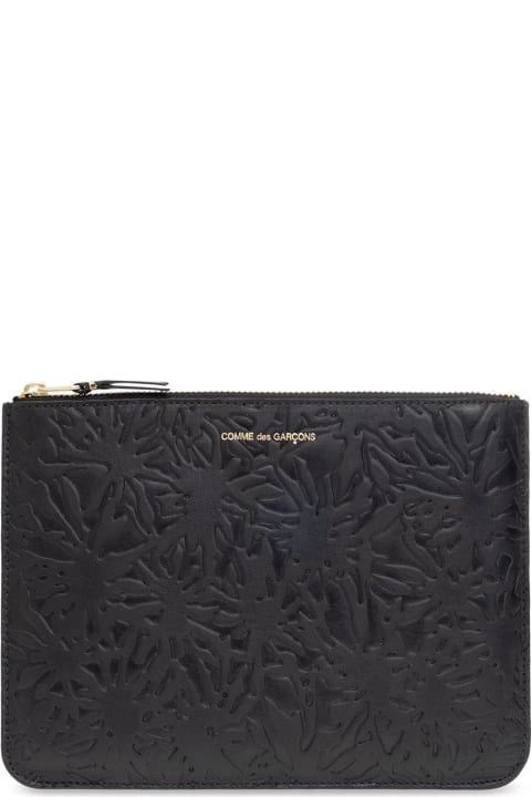 All-over Embossed Zipped Wallet