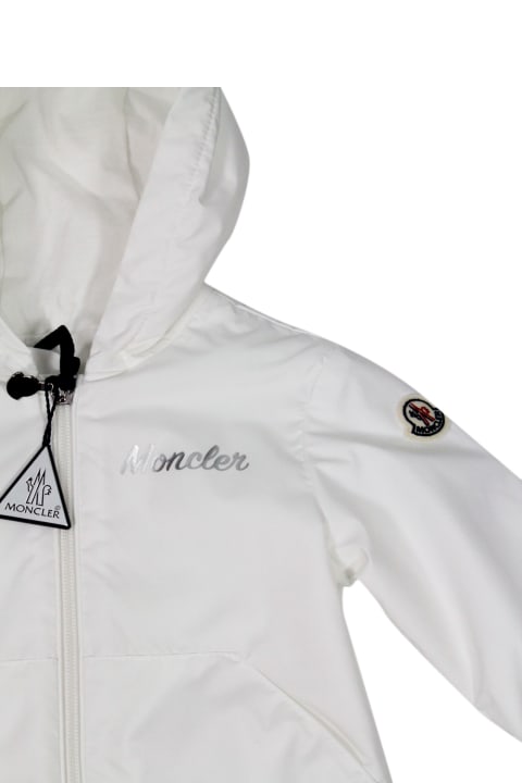 Moncler for Girls Moncler Evanthe Baby Windproof Jacket With Hood And Zip Closure And Silver Logo Writing On The Chest.