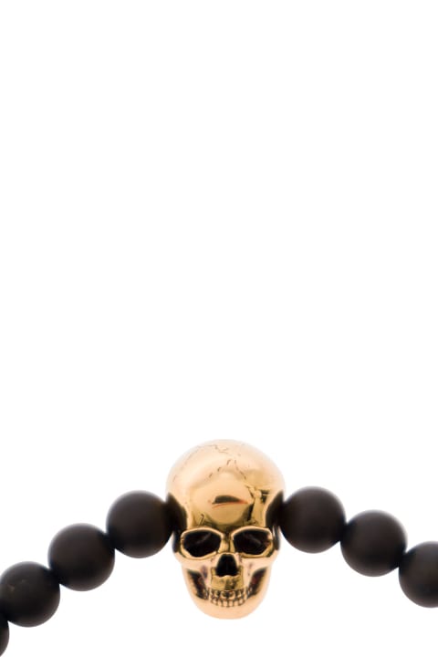 Black Ball Bracelet With Skull Detail In Brass Man