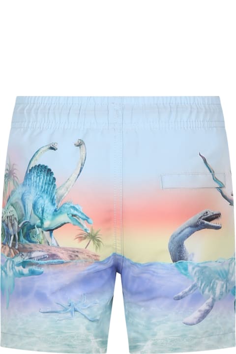 Swimwear for Boys Molo Light Blue Swim Shorts For Boy With Dinosaur Print