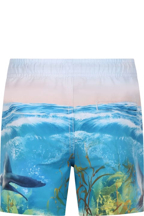 Molo Swimwear for Boys Molo Light Blue Swim Shorts For Boy With Seal Print