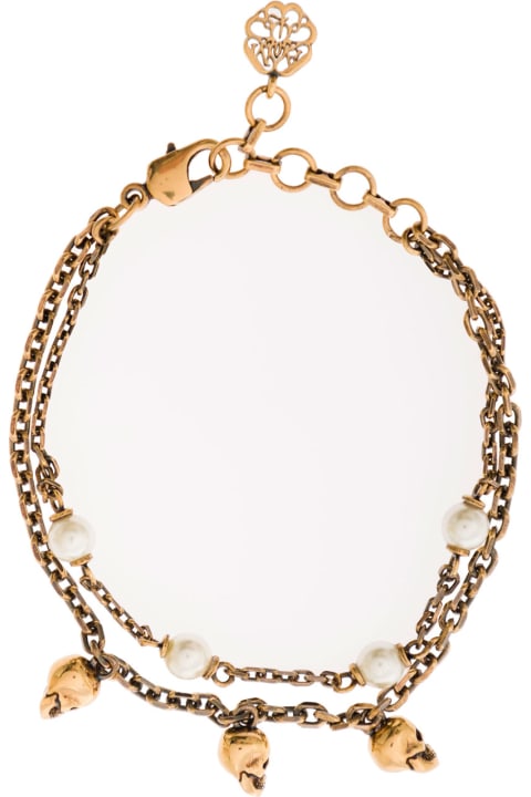 Antique Gold-finished Double-chain Bracelet With Skull And Pearl-like Charm In Brass Woman