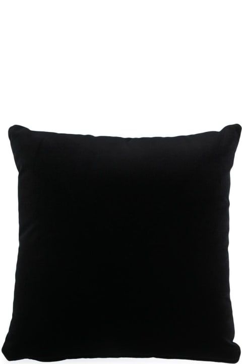 Black Velvet Pillow With Gold Rhinestone Decoration Representing The Versace Logo