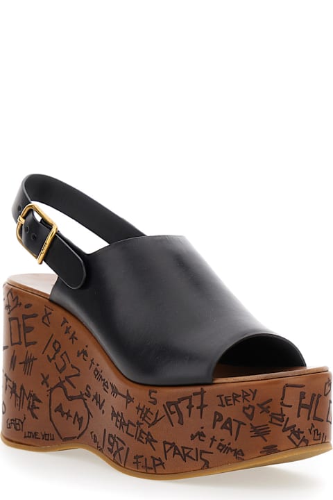 Chloé 
maxime
 Black Wedge With Engraved Written Decorations And Logo Buckle In Leather Woman